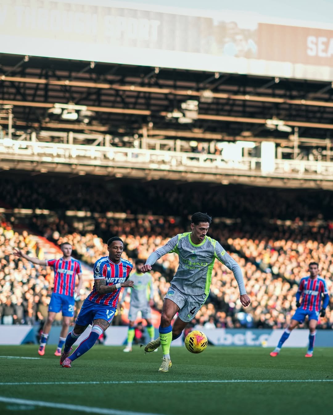 Photo shared by Tijjani Reijnders on December 14, 2025 tagging @mancity. May be an image of football, soccer, ball, crowd, stadium and text that says 'SE/ IN mIr VET VETBE bbeto'.