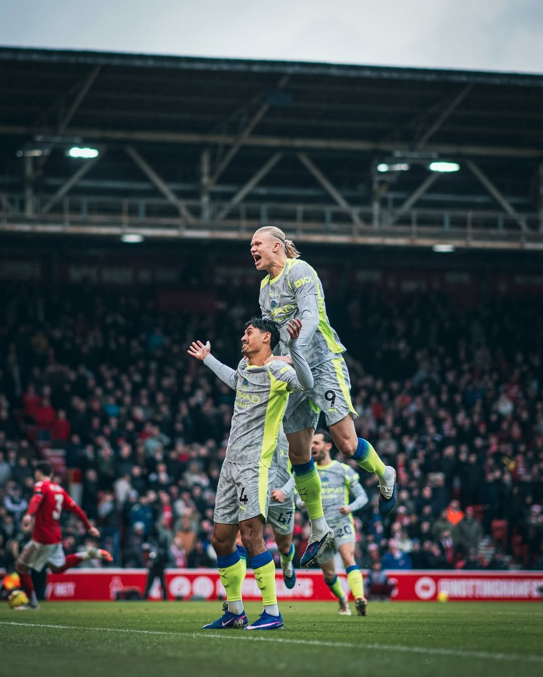 Photo shared by Tijjani Reijnders on December 27, 2025 tagging @mancity, and @erling. May be an image of football, soccer, crowd, stadium and text.