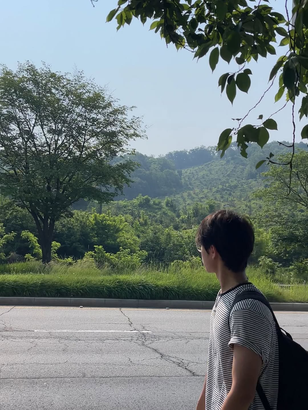Photo by 유빈이tmi on August 14, 2025. May be an image of 1 person, park and text.
