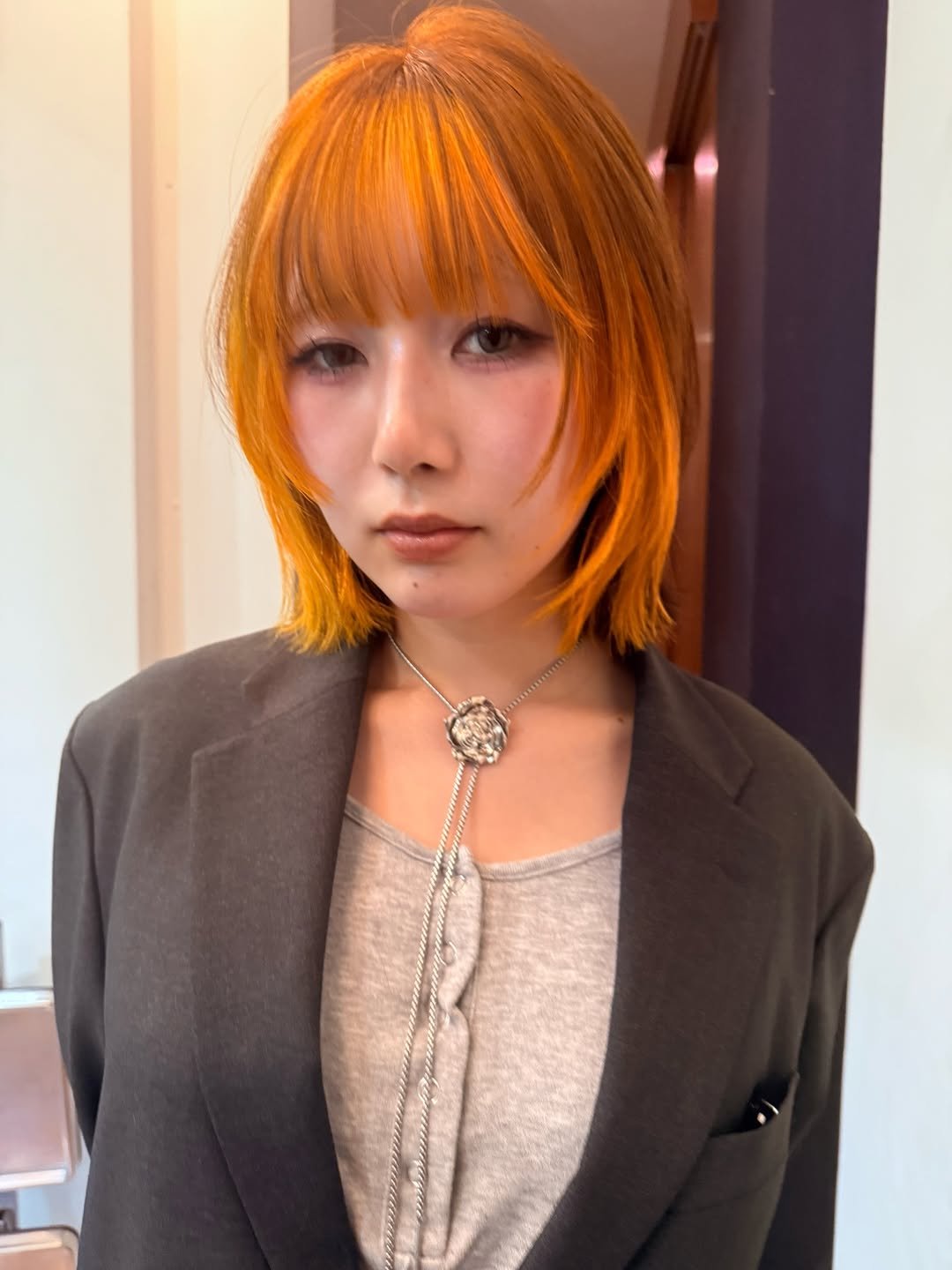 Photo shared by Hikaru Toma/ブリーチパーマ/パーマ/似合わせカット on January 05, 2026 tagging @to_ma.dab. May be an image of one or more people, bangs, braids, top, bolo tie, blazer and text.