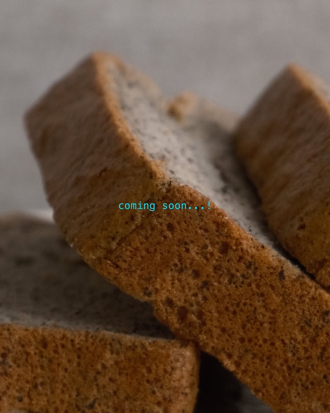 Photo shared by 톰리프 TOMLIF on April 14, 2026 tagging @tomlif_official. May be an image of rye bread, baked goods, toast and text that says 'comingsoon...! coming soon...! soon...'.