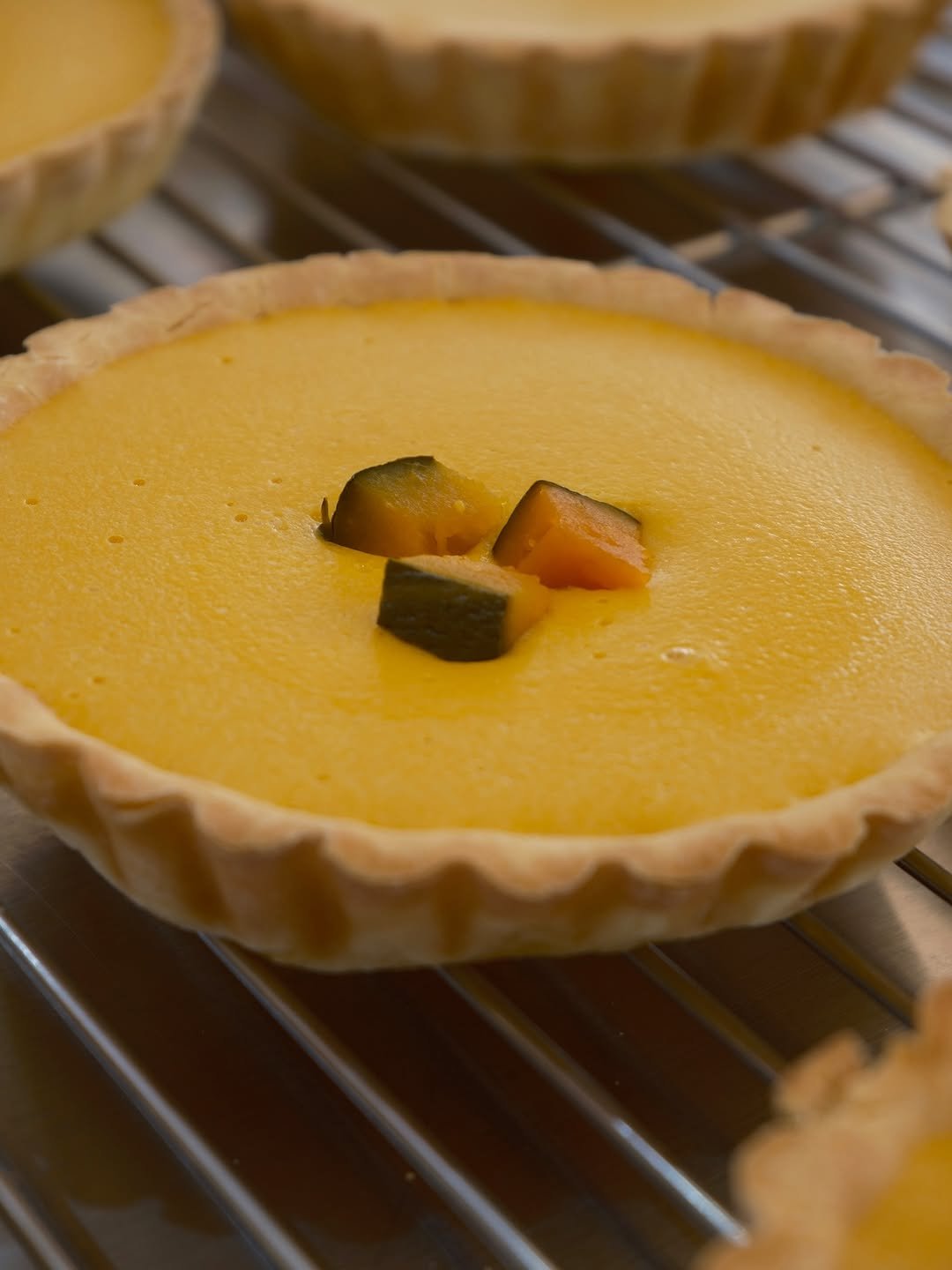 Photo shared by 톰리프 (Tomlif) on September 29, 2025 tagging @tomlif_official, and @tomlif_staff. May be an image of tart, pie and text.