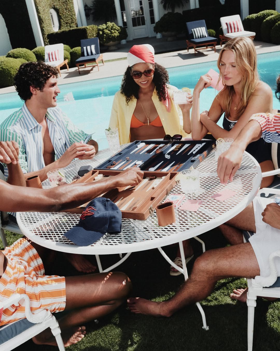 tommyhilfiger 게시물 이미지: Poolside plans: backgammon, sunshine, and...