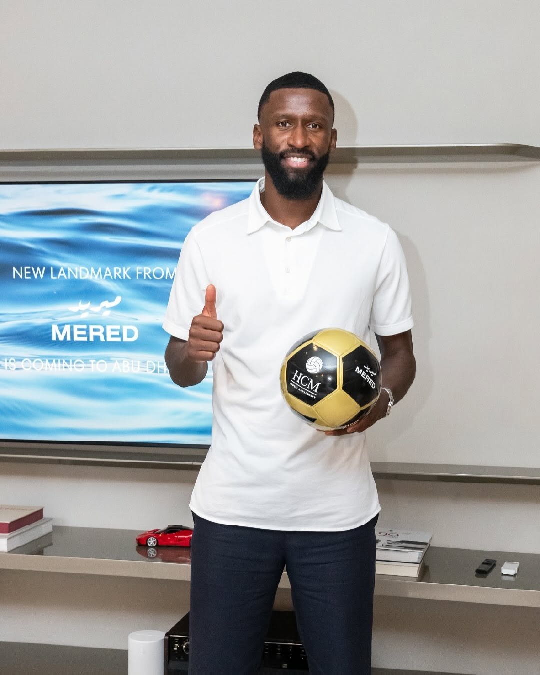 Photo shared by MERED on November 03, 2025 tagging @toniruediger, and @hcmmediaofficial. May be an image of football, soccer, sports equipment, ball, stadium, office and text.