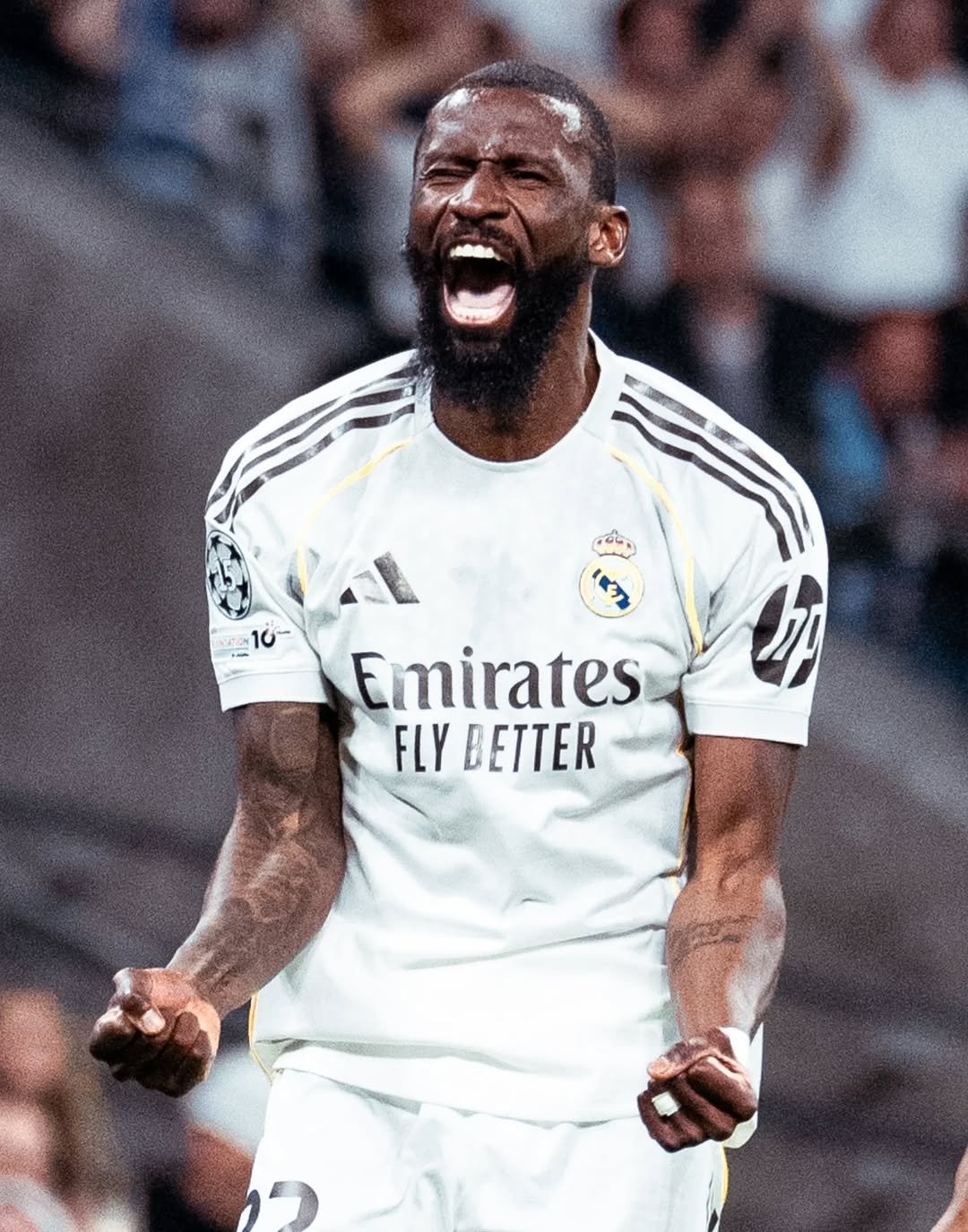 Photo shared by Antonio Rüdiger on March 11, 2026 tagging @realmadrid, and @fredsantosx. May be an image of football, soccer, crowd, stadium and text that says '210- 10 Emirates FLY BETTER'.