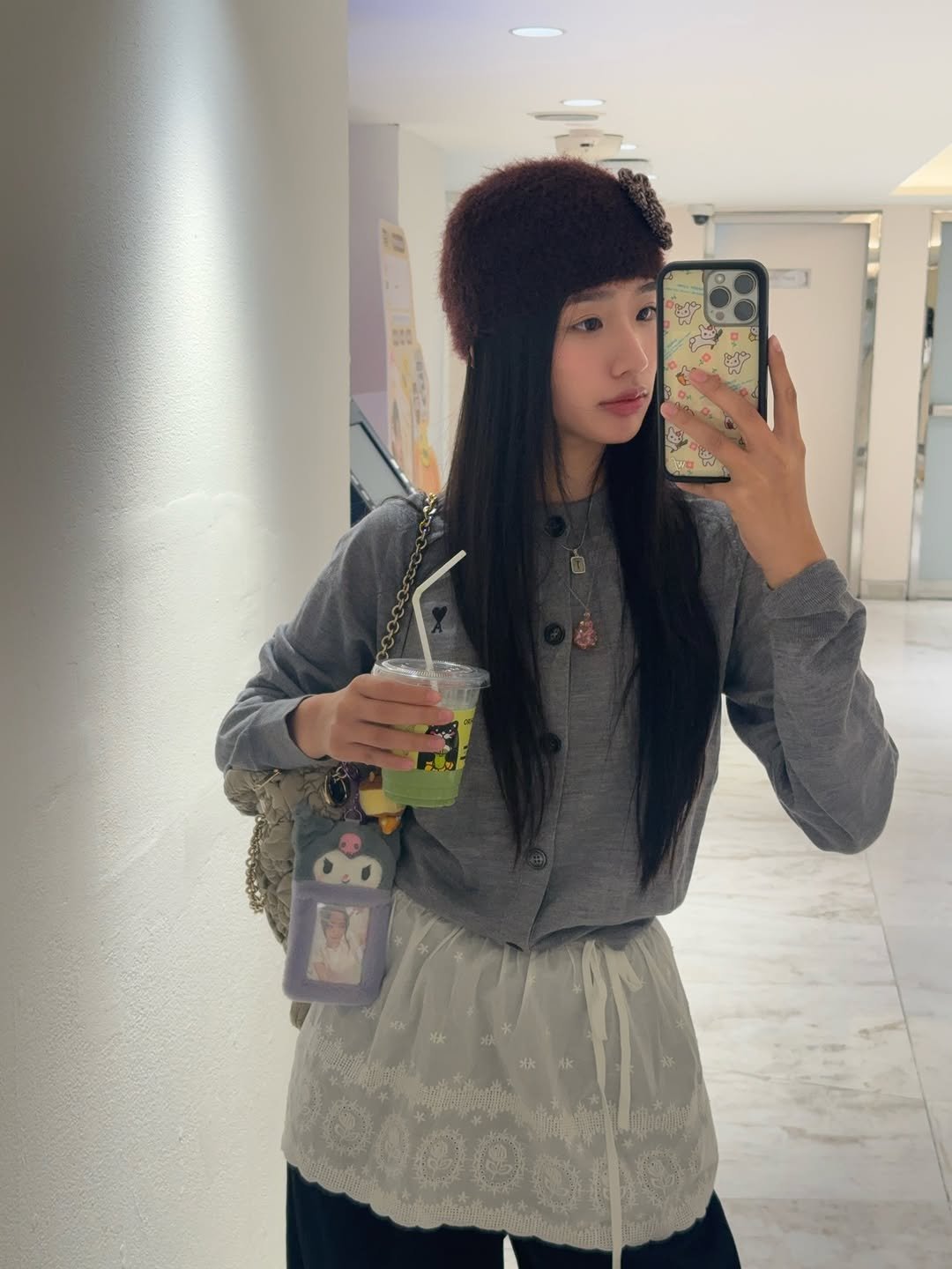 Photo by ตู / t u on April 12, 2026. May be a selfie of hat, phone, beret and text.