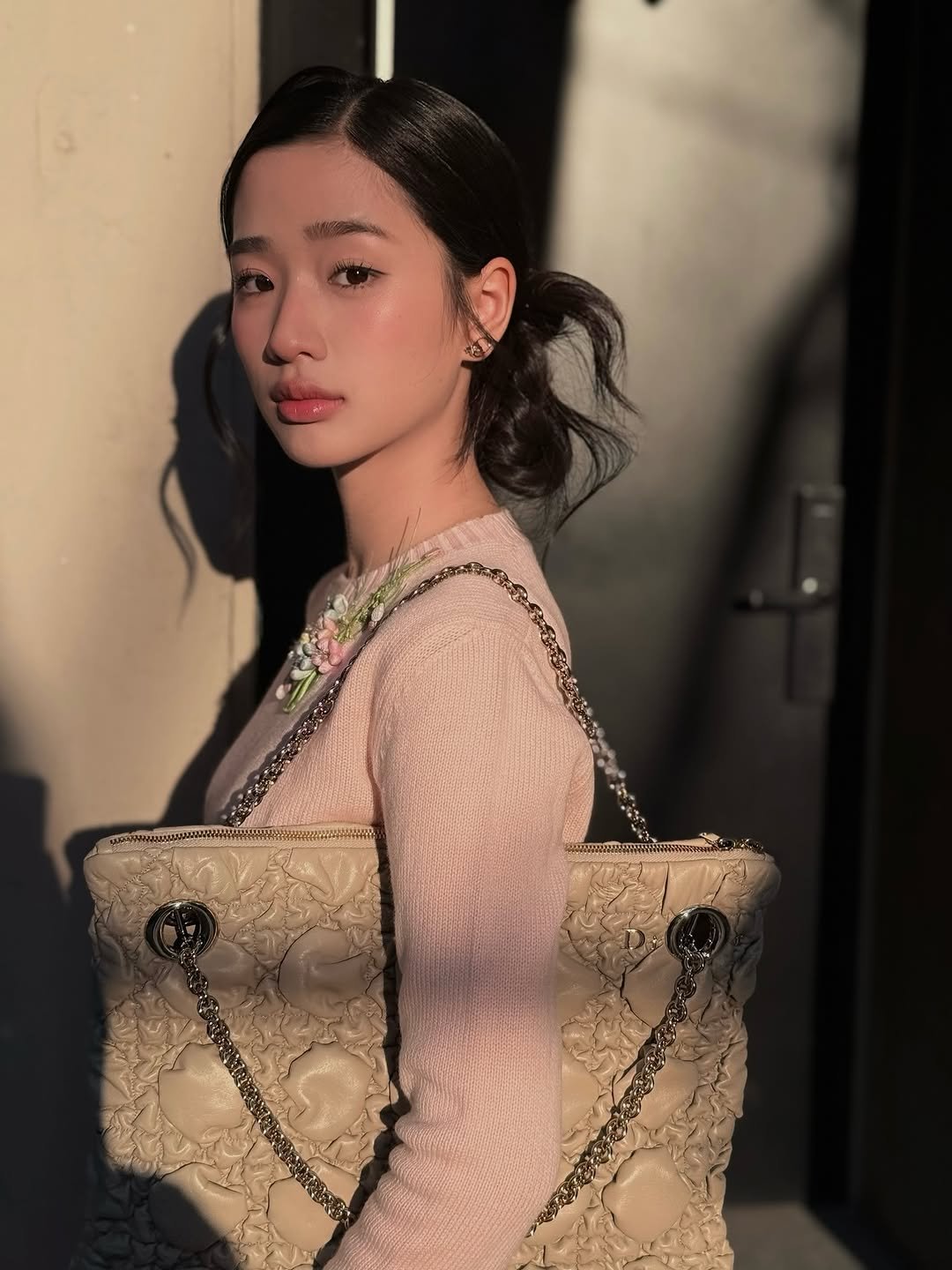 Photo by ตู / t u on April 11, 2026. May be an image of one or more people, makeup, purse and text.