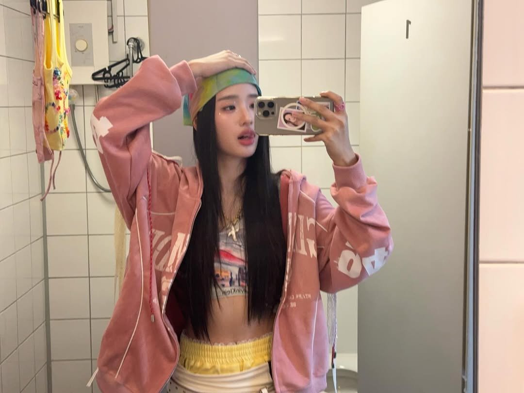 Photo by ตู / t u on December 20, 2025. May be a selfie of one or more people, hair, phone, top, headscarf, bath robe and text.