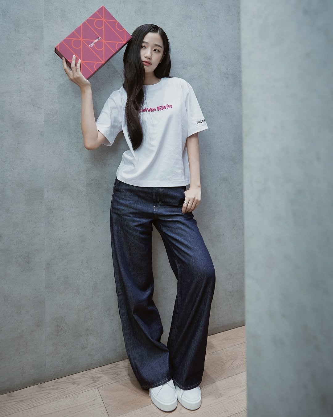 Photo shared by ตู / t u on December 18, 2025 tagging @calvinklein. May be an image of sleepwear, sweatpants, top and text.