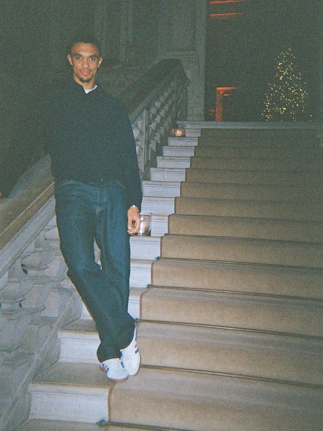 Photo by Trent Alexander-Arnold on December 31, 2025. May be an image of standing, turtleneck and text.