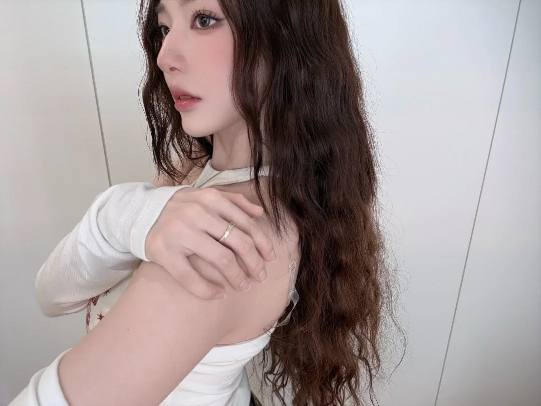 Photo shared by tripleS HOUSE on March 30, 2026 tagging @triplescosmos. May be a closeup of one or more people, long hair and text.