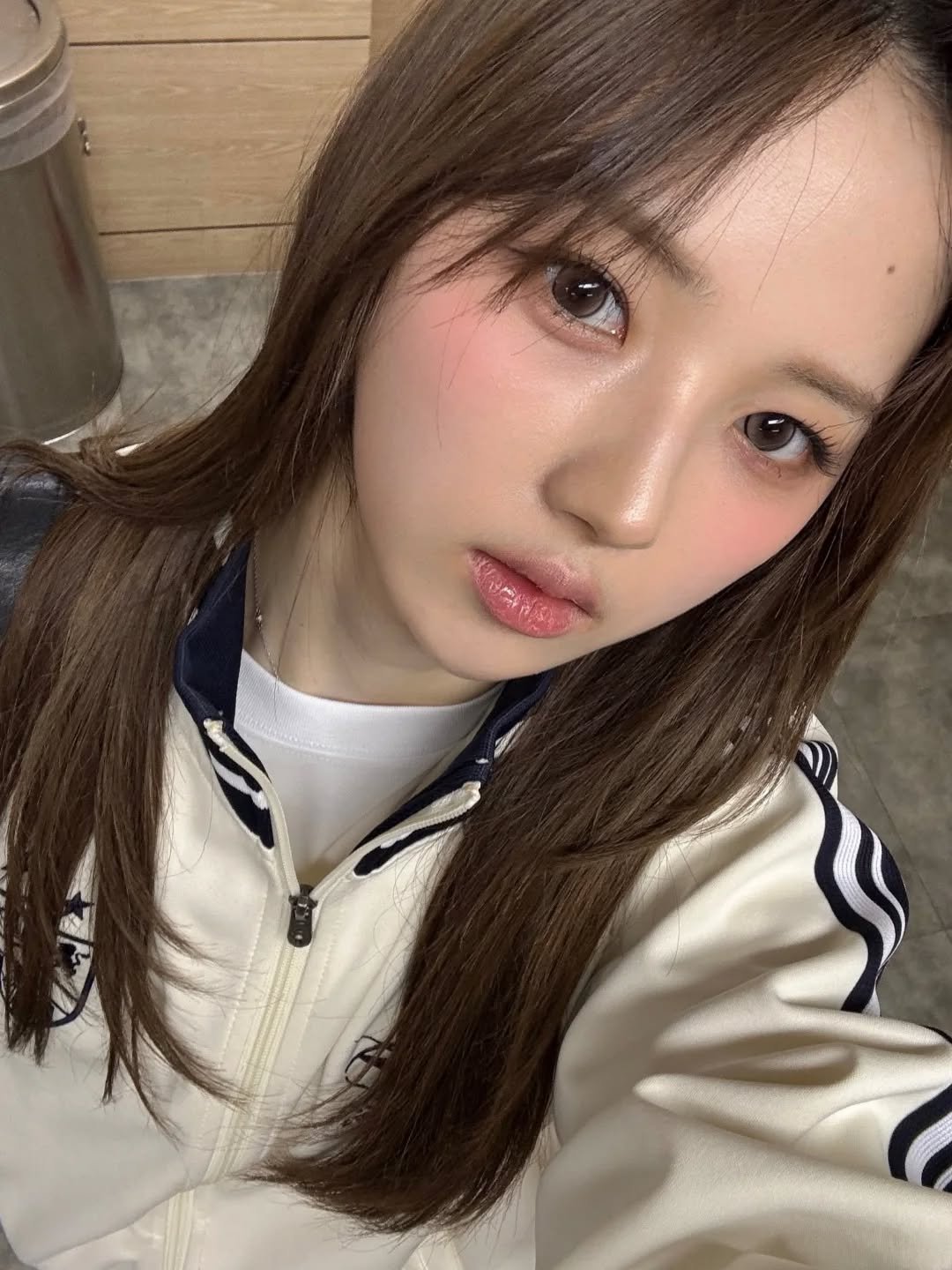 Photo shared by tripleS HOUSE on March 30, 2026 tagging @triplescosmos. May be an image of one or more people, hair, parka and text.