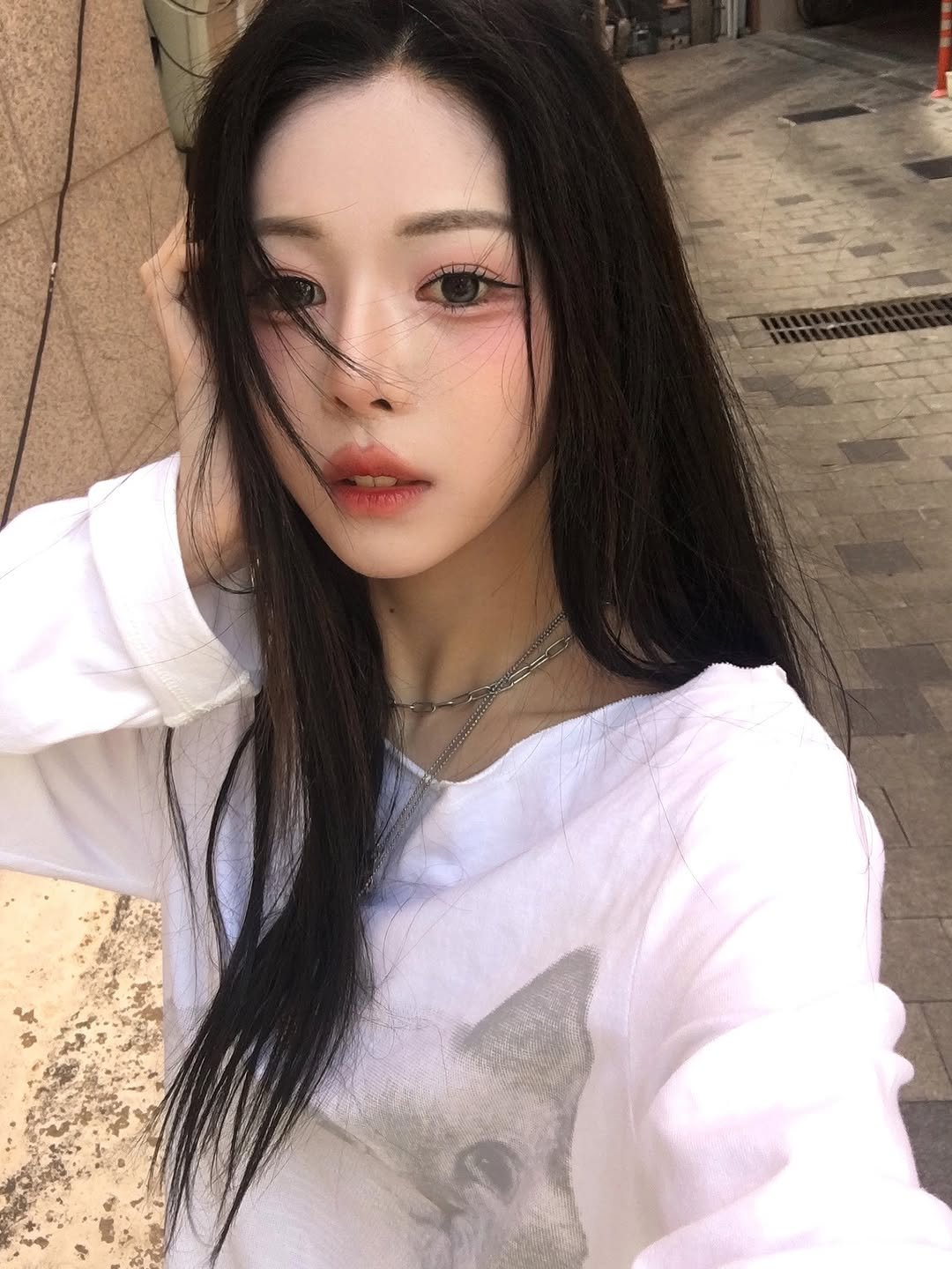 Photo by tripleS official on March 27, 2026. May be a selfie of one or more people, makeup, hair, top and text.