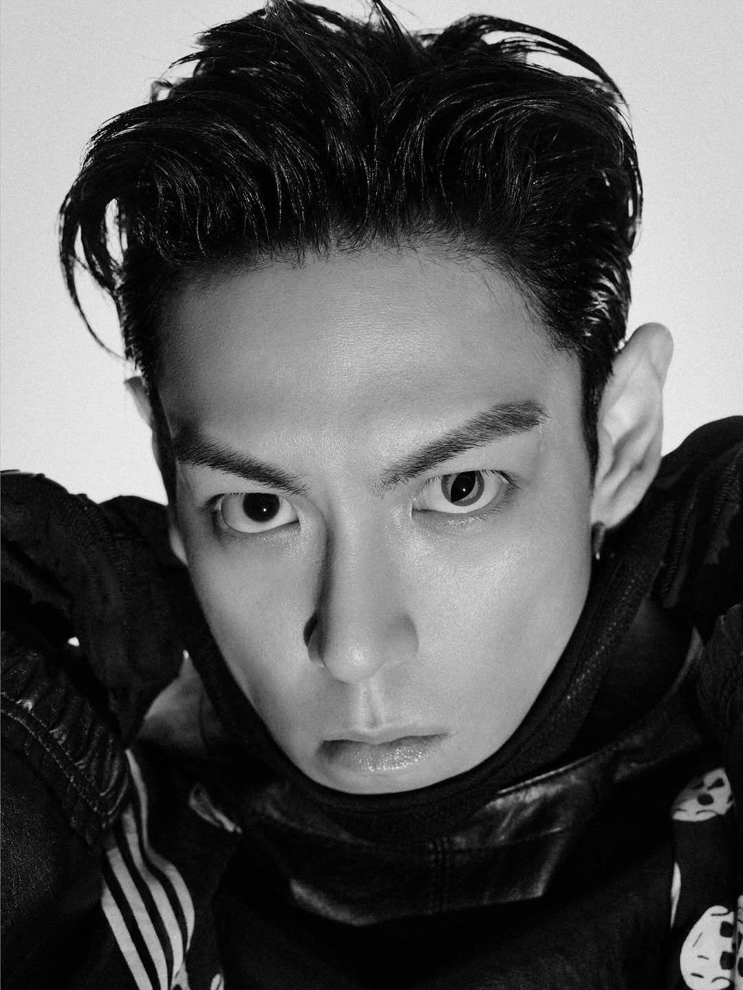 Photo shared by T.O.P on March 12, 2026 tagging @topspot_pictures. May be an image of one or more people, bangs, top and text.
