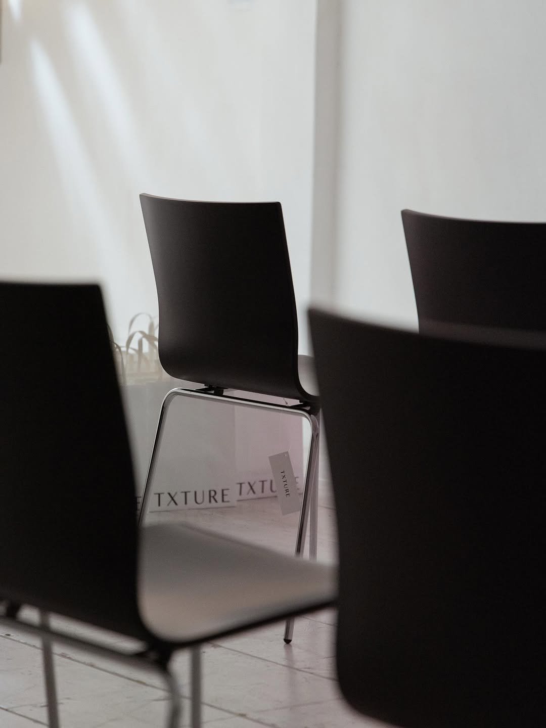 Photo by TXTURE on September 08, 2025. May be an image of armchair, chair, indoors and text.