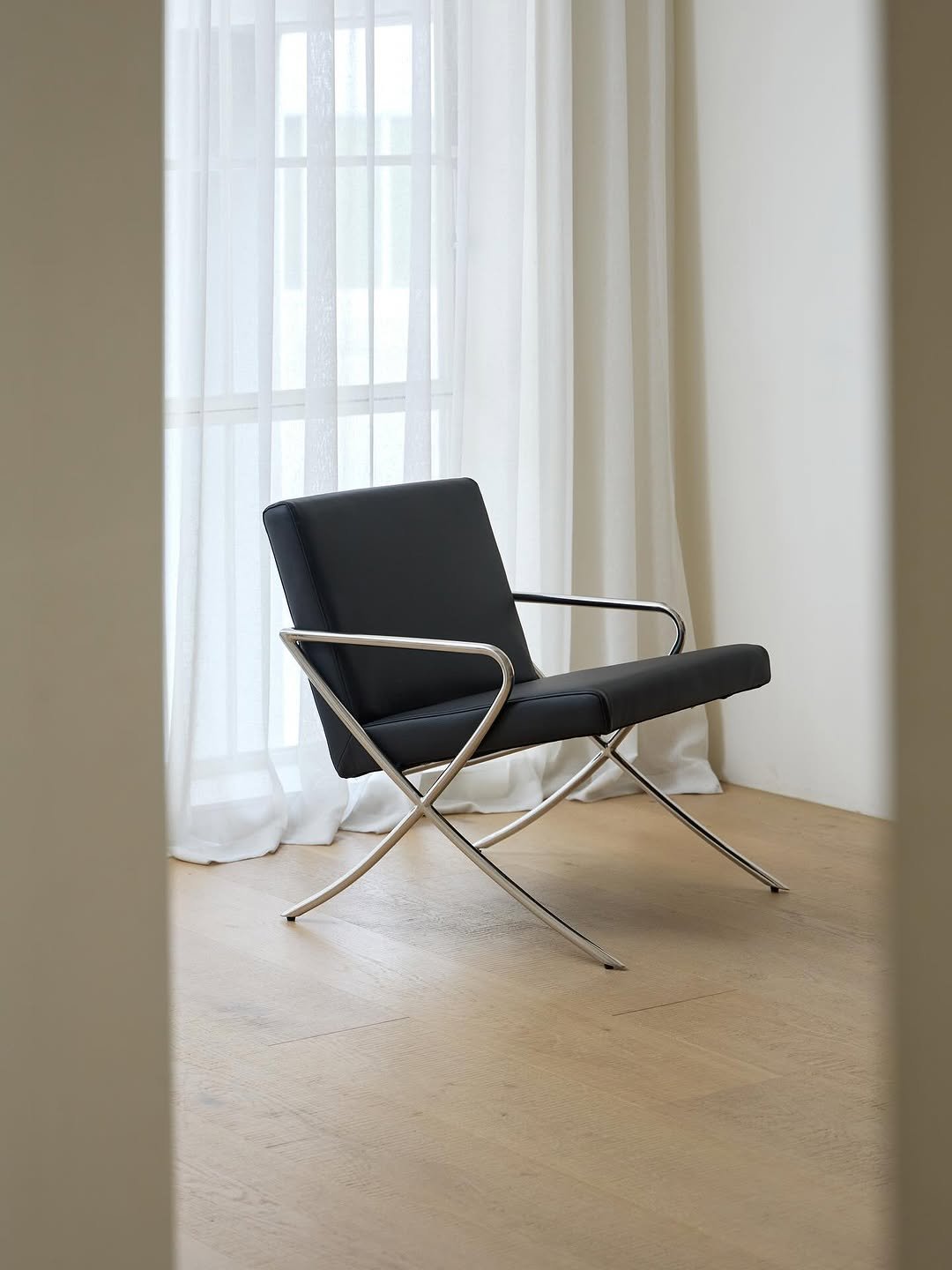 Photo by TXTURE on August 17, 2025. May be an image of curtains, armchair, rocking chair, chair, chaise lounge, indoors and text.