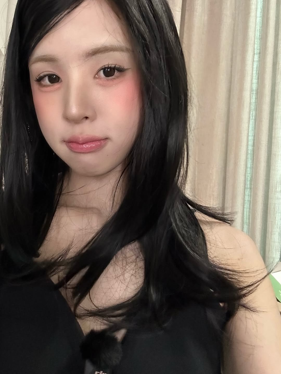 Photo by 재유JEYU on July 31, 2025. May be an image of 1 person, makeup, hair, costume and text.