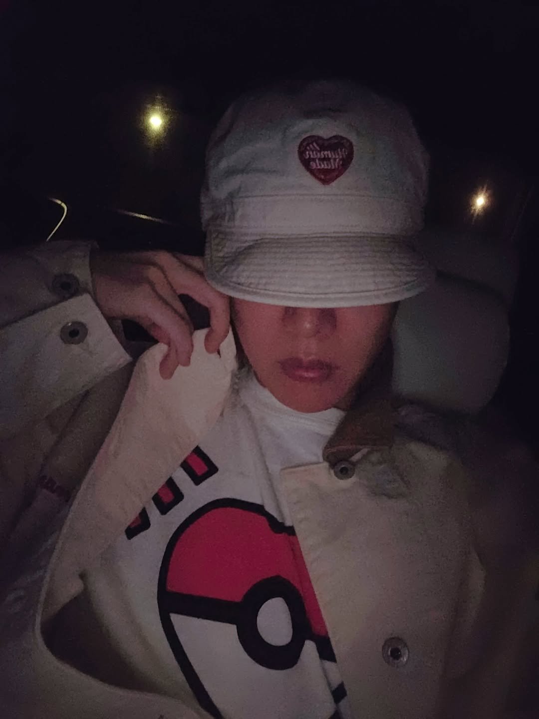 Photo by jhope on October 19, 2025. May be an image of hat, duffle coat, raincoat, parka, sweatshirt, jacket, night and text.