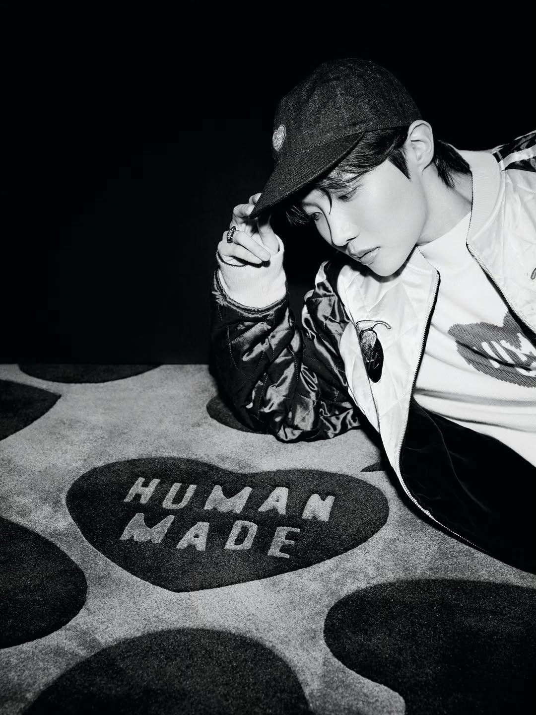 Photo by jhope on December 03, 2025. May be a black-and-white image of one or more people, bangs, hat, top, manhole and bolo tie.