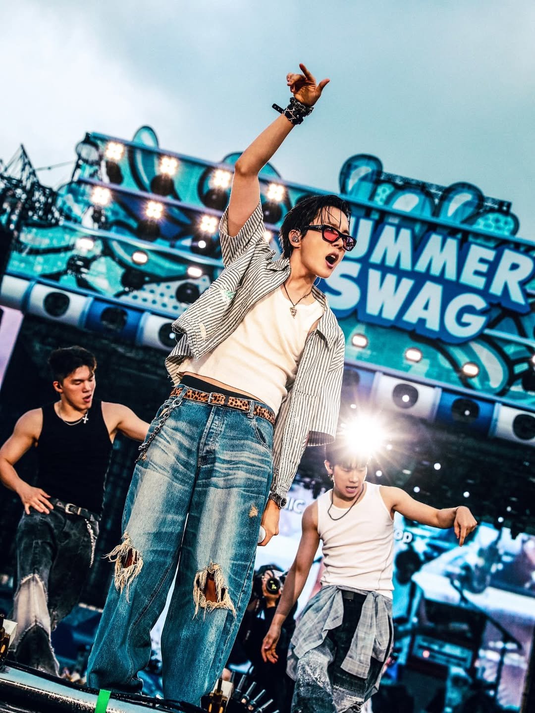 Photo shared by jhope on July 05, 2025 tagging @42psy42. May be an image of dancing, glasses, crowd, concert and text.