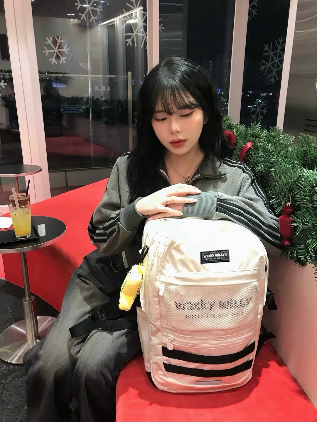 Photo shared by 유빈 on December 23, 2025 tagging @wackywilly_kr. May be an image of purse, sling and text.