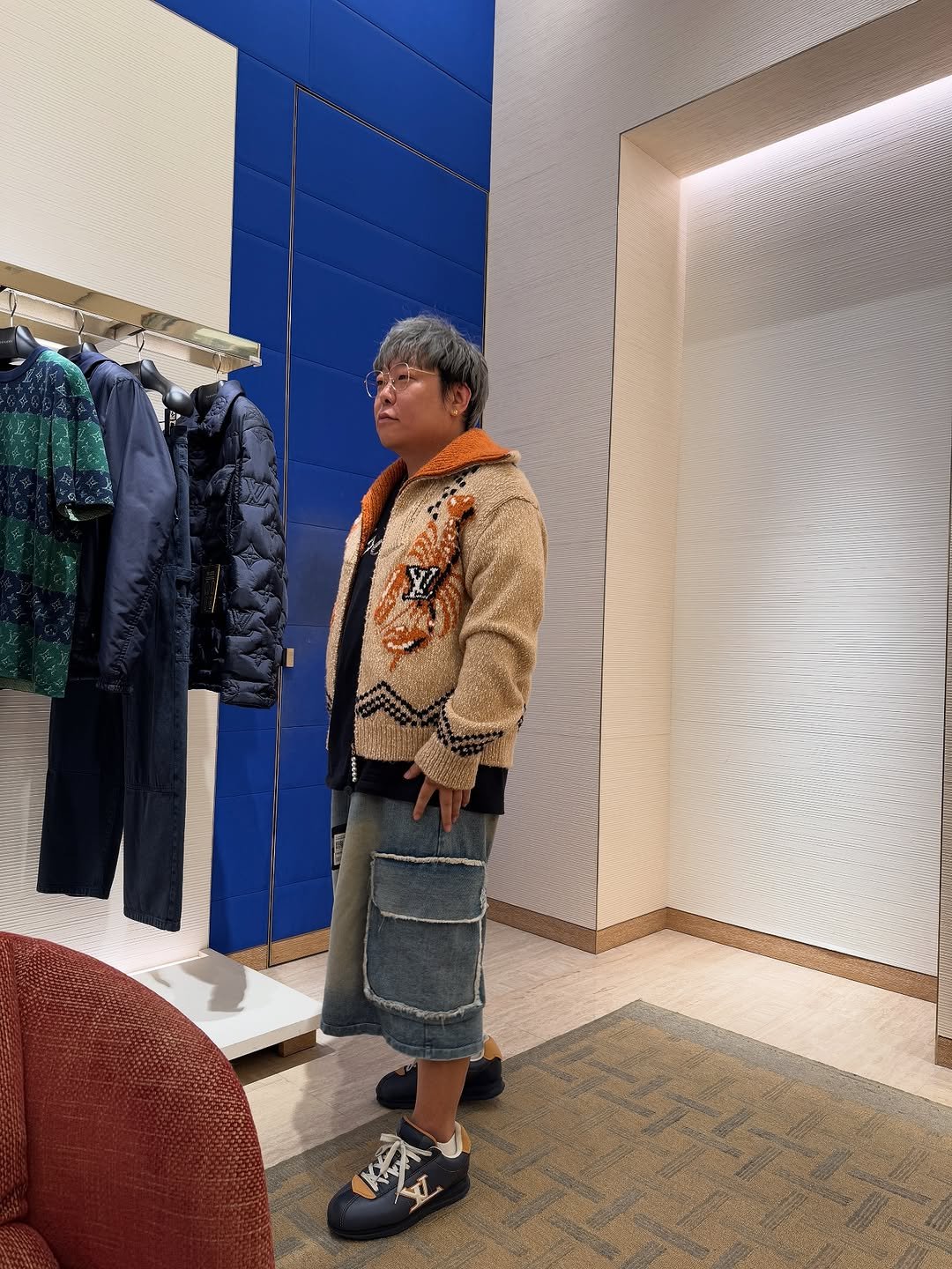 Photo by 어비 on September 12, 2025. May be an image of 1 person, duffle coat and text.