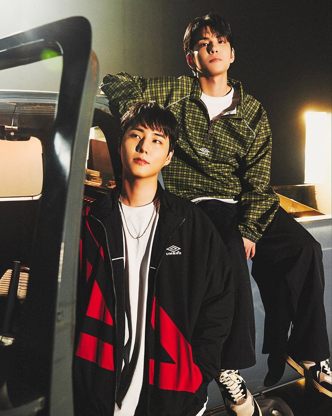 Photo shared by 엄브로 코리아 on September 16, 2025 tagging @day6kilogram. May be an image of one or more people, bangs, makeup, parka, top, bolo tie, military uniform and text.