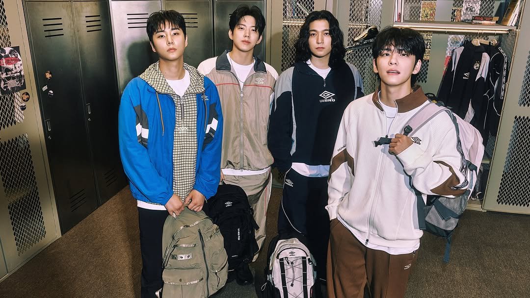 Photo shared by 엄브로 코리아 on January 05, 2026 tagging @day6kilogram. May be an image of one or more people, bangs, sportswear and text.