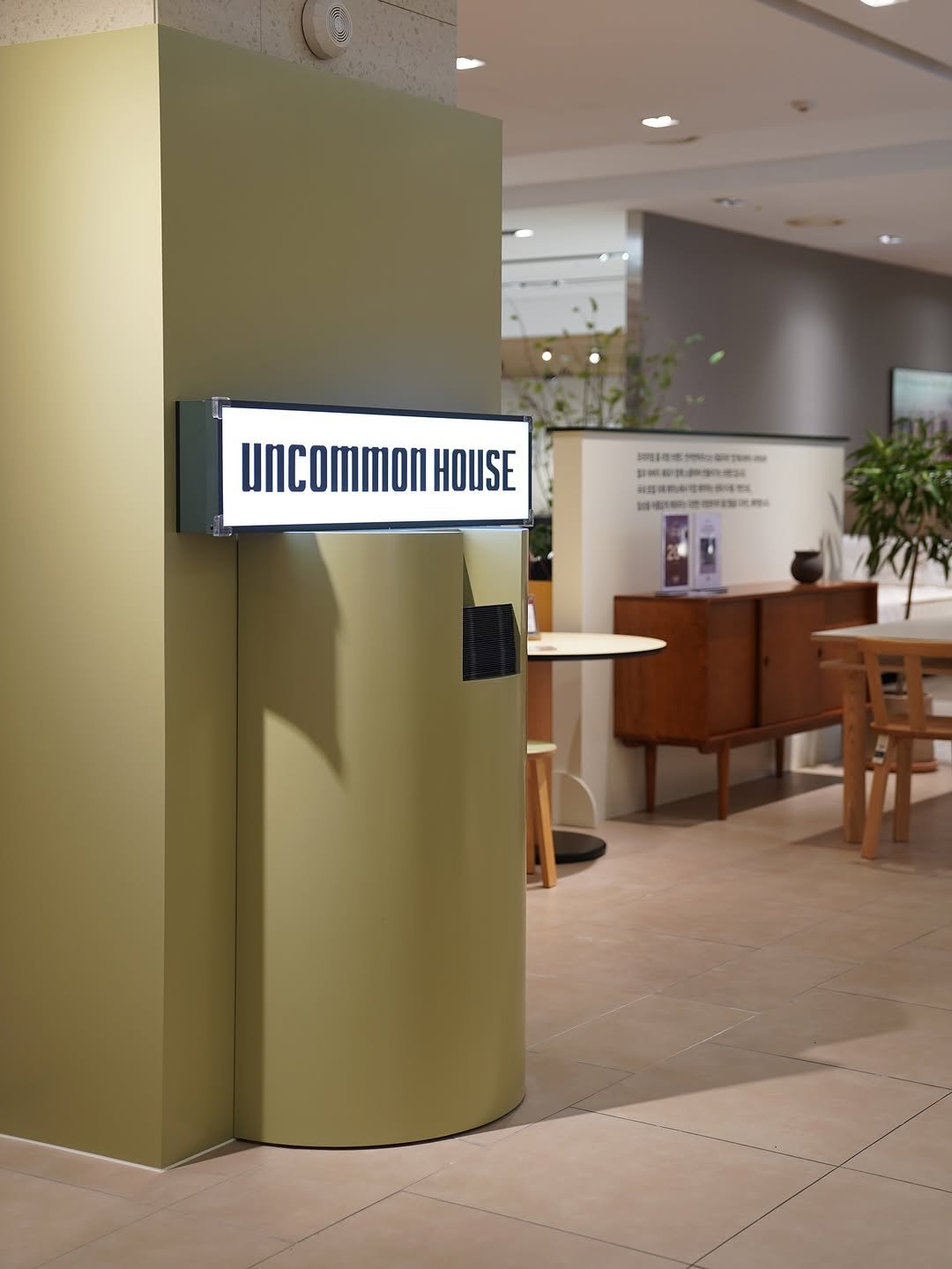 Photo by 언커먼하우스 UNCOMMON HOUSE on August 13, 2025. May be an image of lighting, bureau, display case, indoors, office and text.