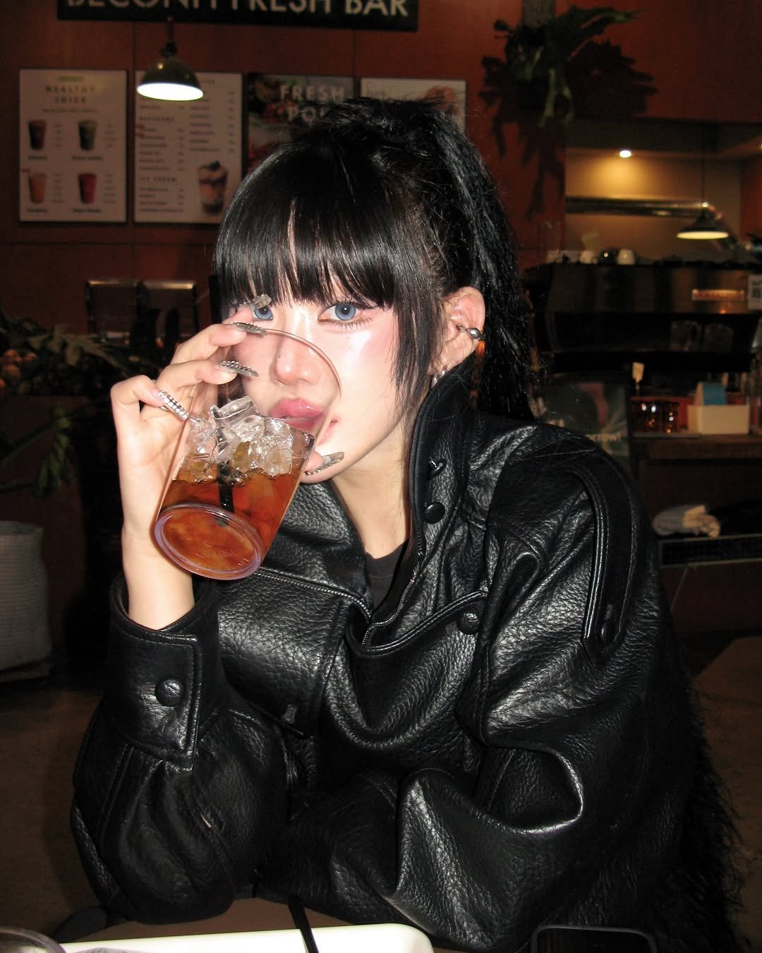 Photo shared by 뉴미 on February 15, 2026 tagging @zara. May be an image of one or more people, bangs, alcohol and text.