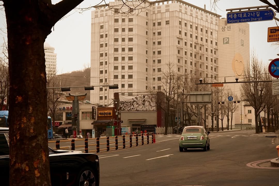 Photo by 선우 in 서울. May be an image of one or more people, trolley, street, road, buildings and text.