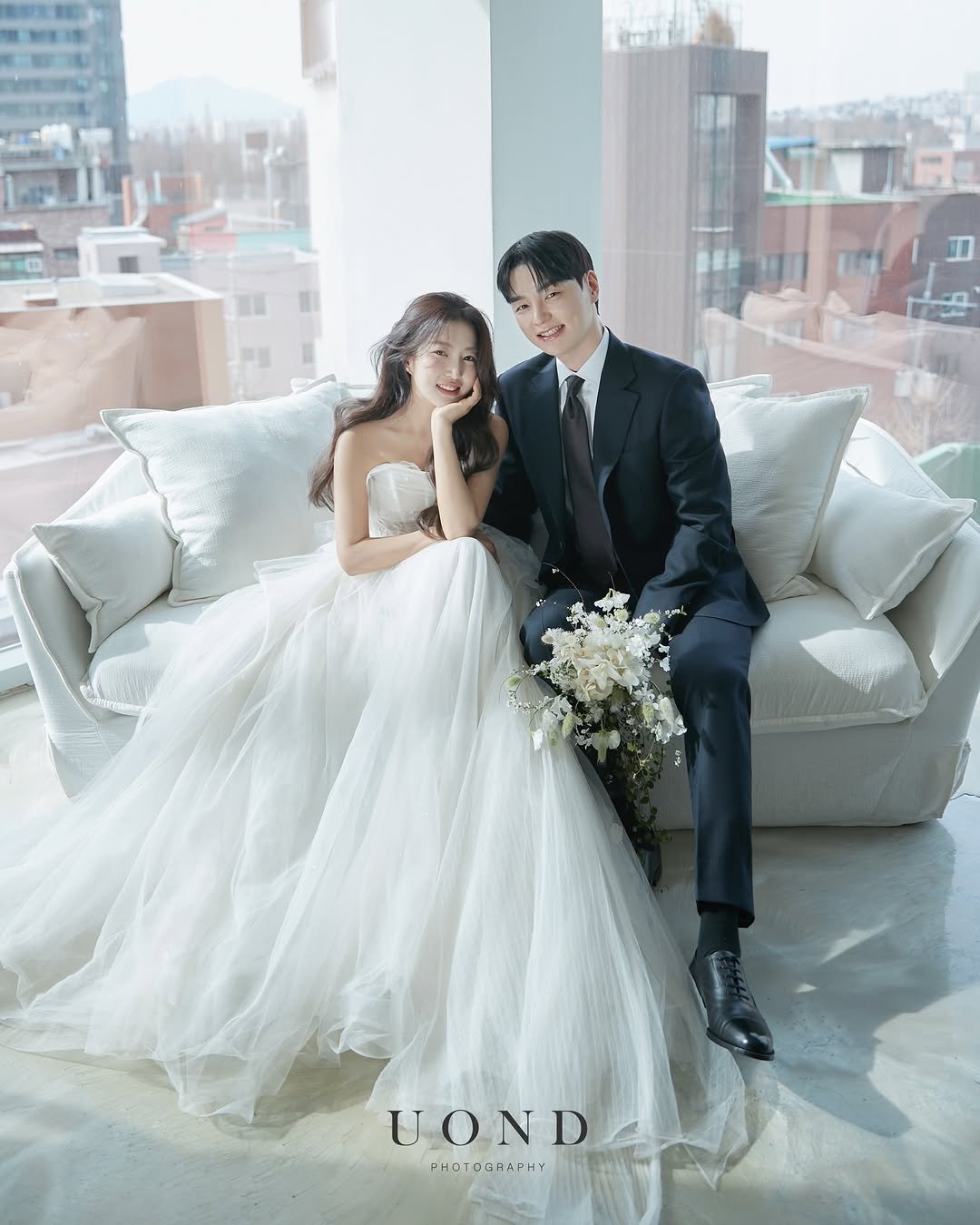 Photo shared by 유온드 on March 12, 2026 tagging @pangdisu_, @8mk8, @verygoodwedding, @thewhite.elisabeth, @merykim486, @o.long__jeni_, @thenyuz.official, @deihee_wedding, and @thenyuz.cake. May be an image of dress, wedding and text that says 'NTC UOND PHOTOGRAPHY PHCTO MNa'.