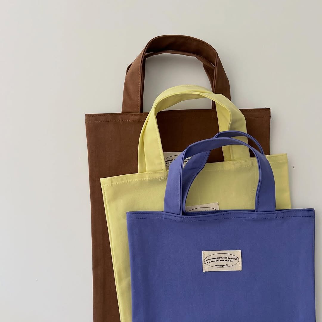 Photo shared by 유 어 메 세 지 on August 14, 2025 tagging @urmessage_. May be an image of tool bag, grocery bag and text.