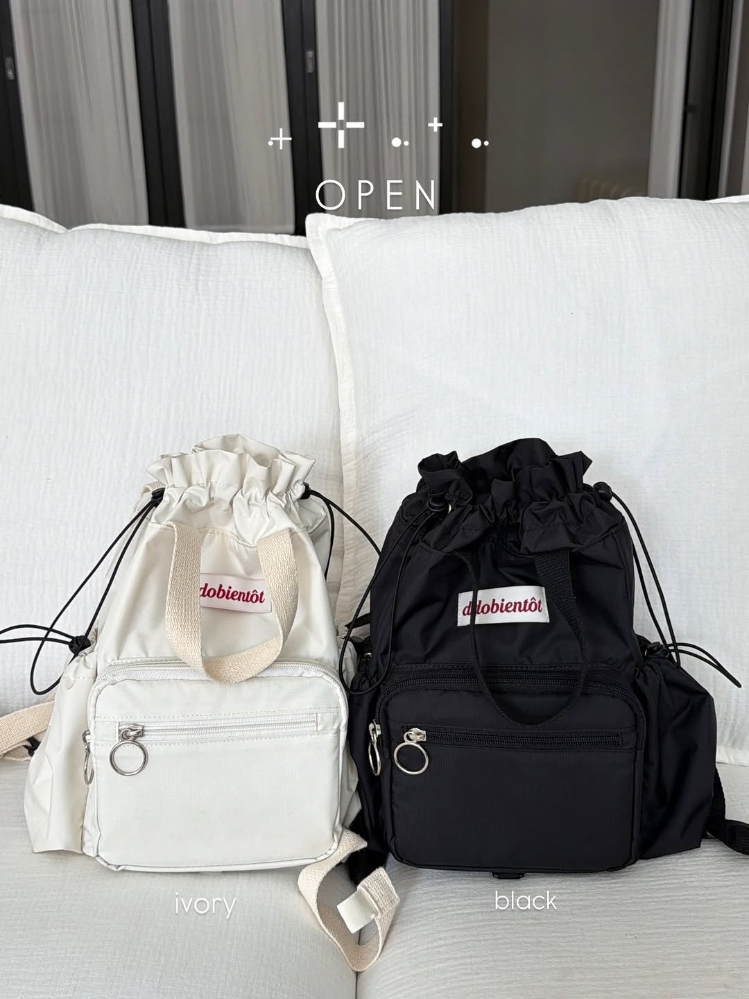 Photo by 율윤이네 : )♥️강세라 on April 27, 2026. May be an image of purse, drawstring, pouch and text that says 'OPEN dobientôt lobientôl lobientôt 8 ivory black'.