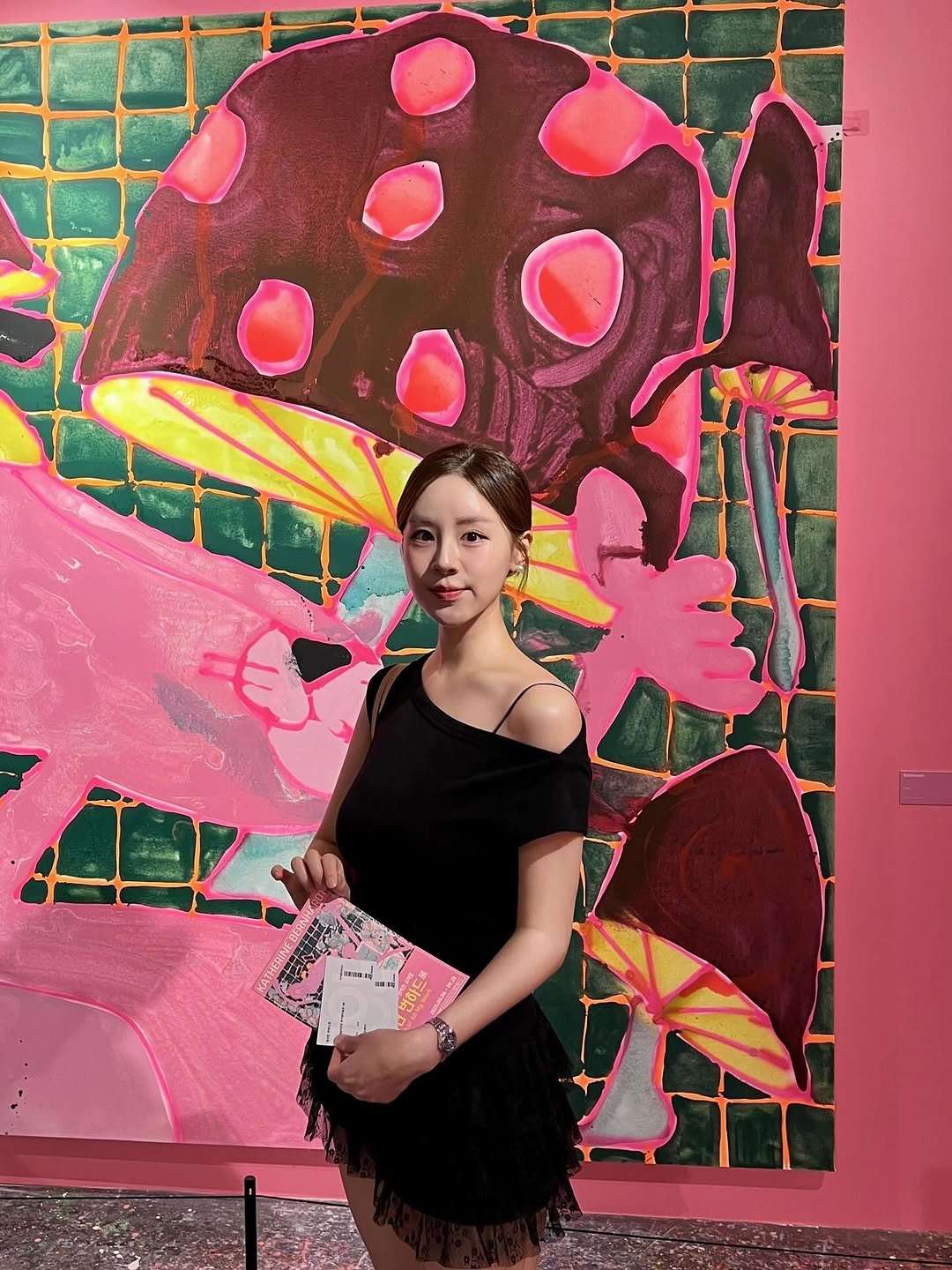 Photo shared by 김희수 on August 30, 2025 tagging @seoul_arts_center, and @unc_exhibition. May be an image of 1 person, dress, parasol and text.