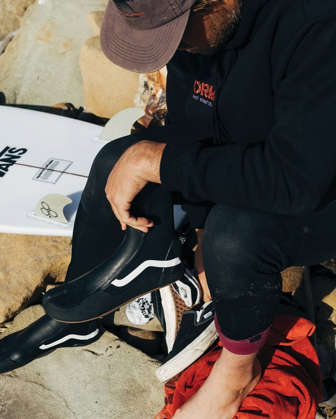 Photo shared by vans on December 19, 2025 tagging @sealtooth, and @vanssurf. May be an image of surfboard, skateboard, wetsuit, water, ocean and text.