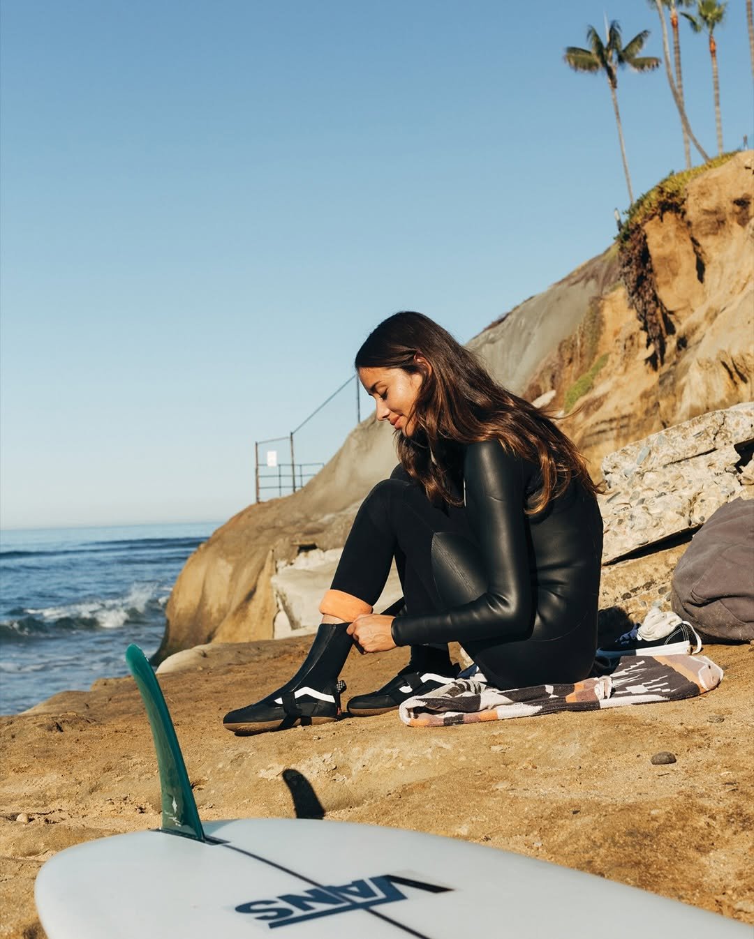 Photo shared by Vans Surf on December 26, 2025 tagging @madelinermillerr. May be an image of surfboard, wetsuit, water, ocean and text.