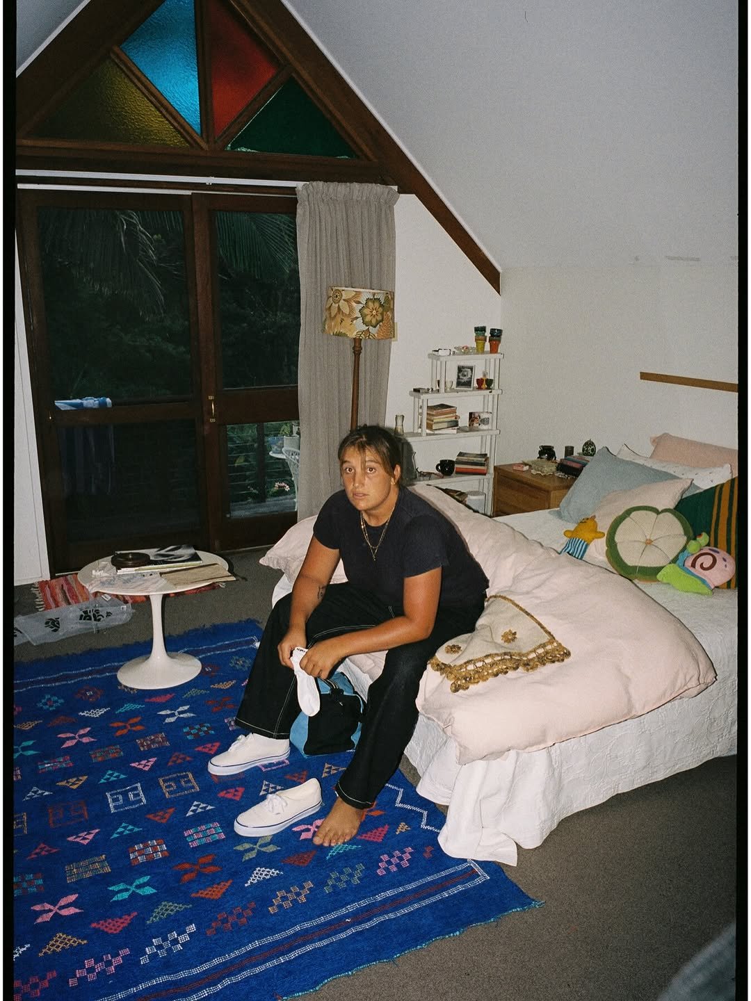 Photo shared by vans on April 26, 2026 tagging @hollywawn, and @vanssurf. May be an image of clothes iron, bed, mattress, bedroom and text.