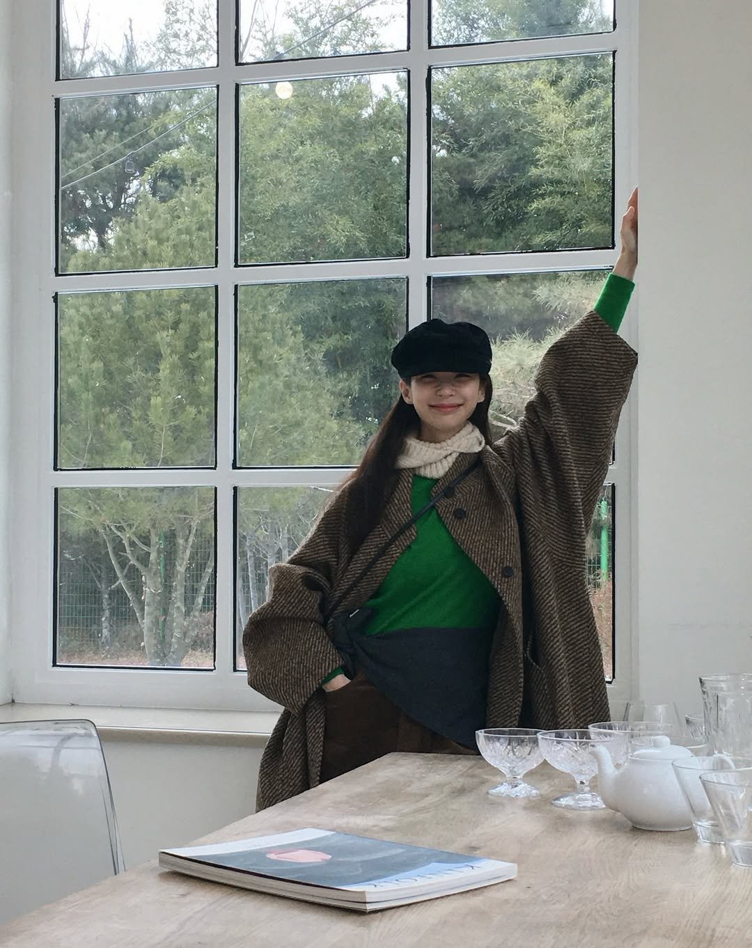 Photo shared by 쏘블리[velyvelysso]ssowhat🤍 on December 13, 2025 tagging @ethosofficial_. May be an image of fur coat, parka, cloak, cardigan, turtleneck, beret and text.