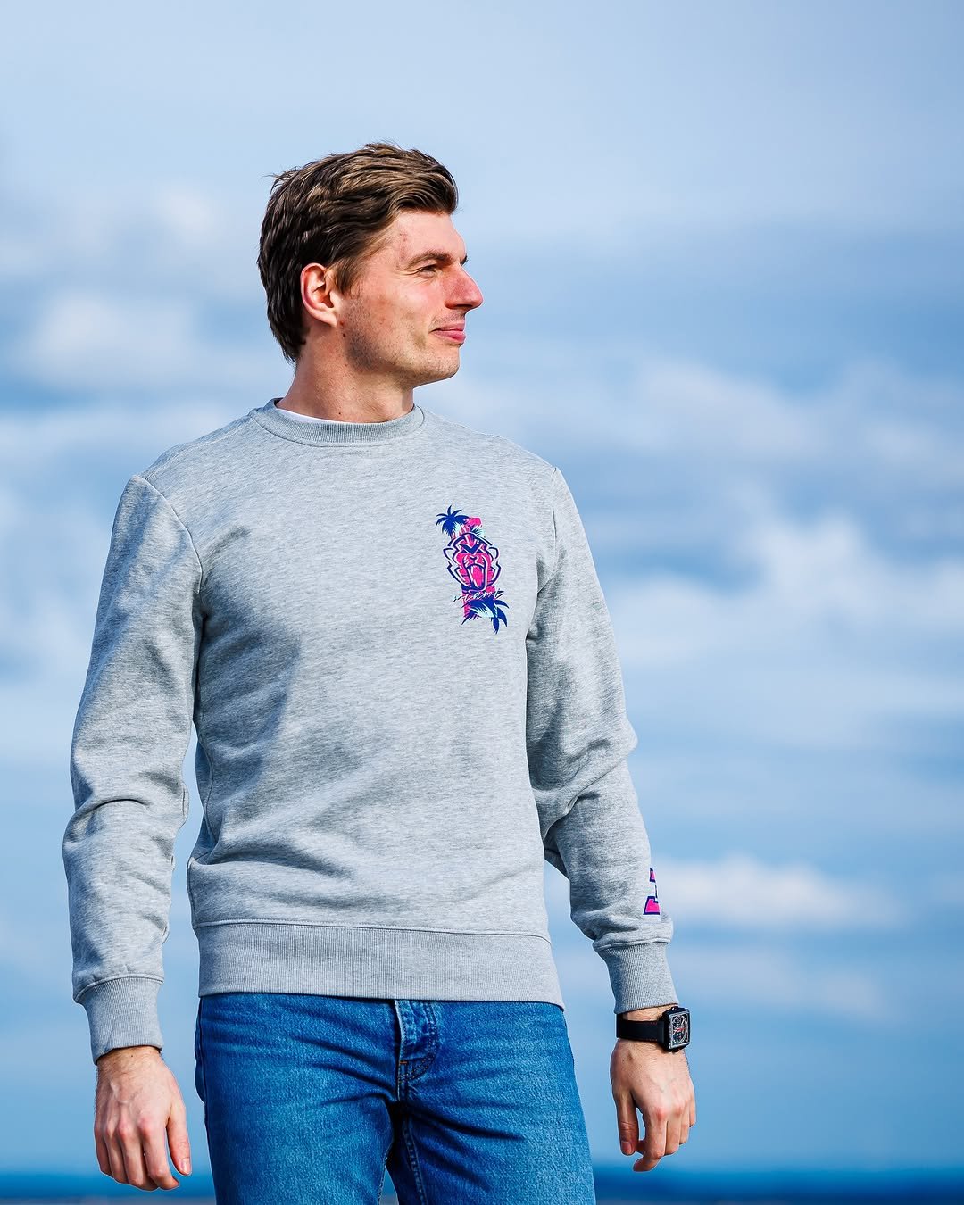 Photo shared by Verstappen.com on April 27, 2026 tagging @maxverstappen1. May be an image of one or more people, sweater, fleece, sweatshirt and text.