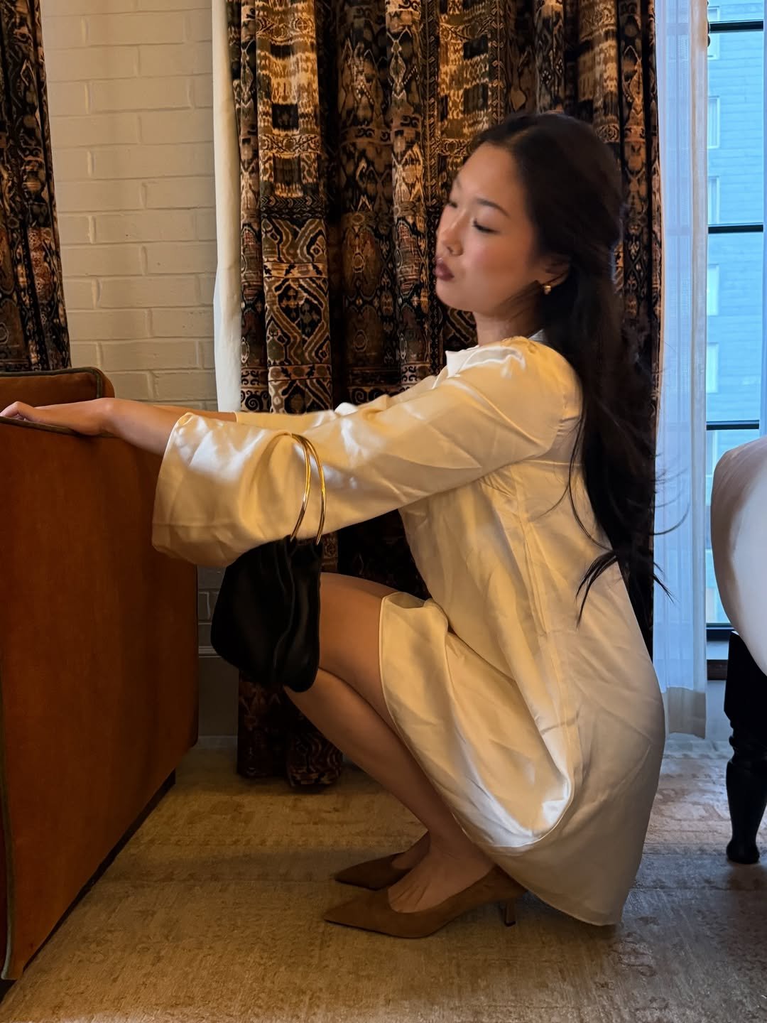 Photo by VIA LI on February 14, 2026. May be an image of sleepwear, curtains, barong and text.