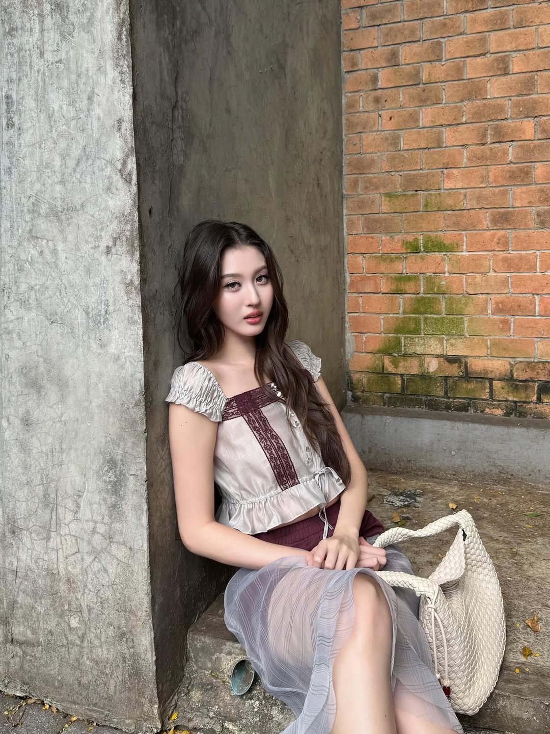 Photo shared by Benyapa j. on December 25, 2025 tagging @polarboll. May be an image of skirt, dress, sundress and text.