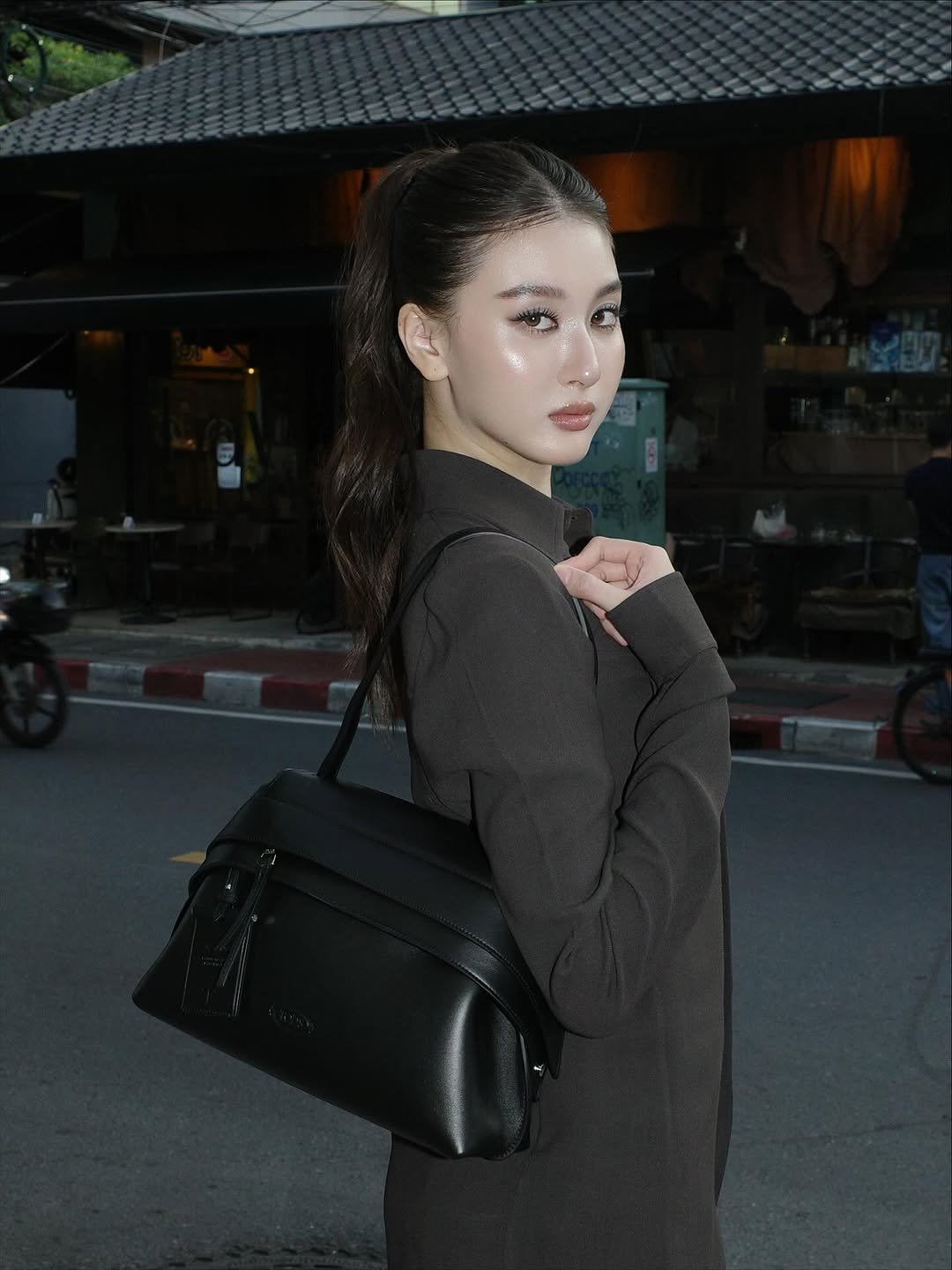 Photo by Benyapa j. on October 27, 2025. May be an image of leather, purse, briefcase and text.