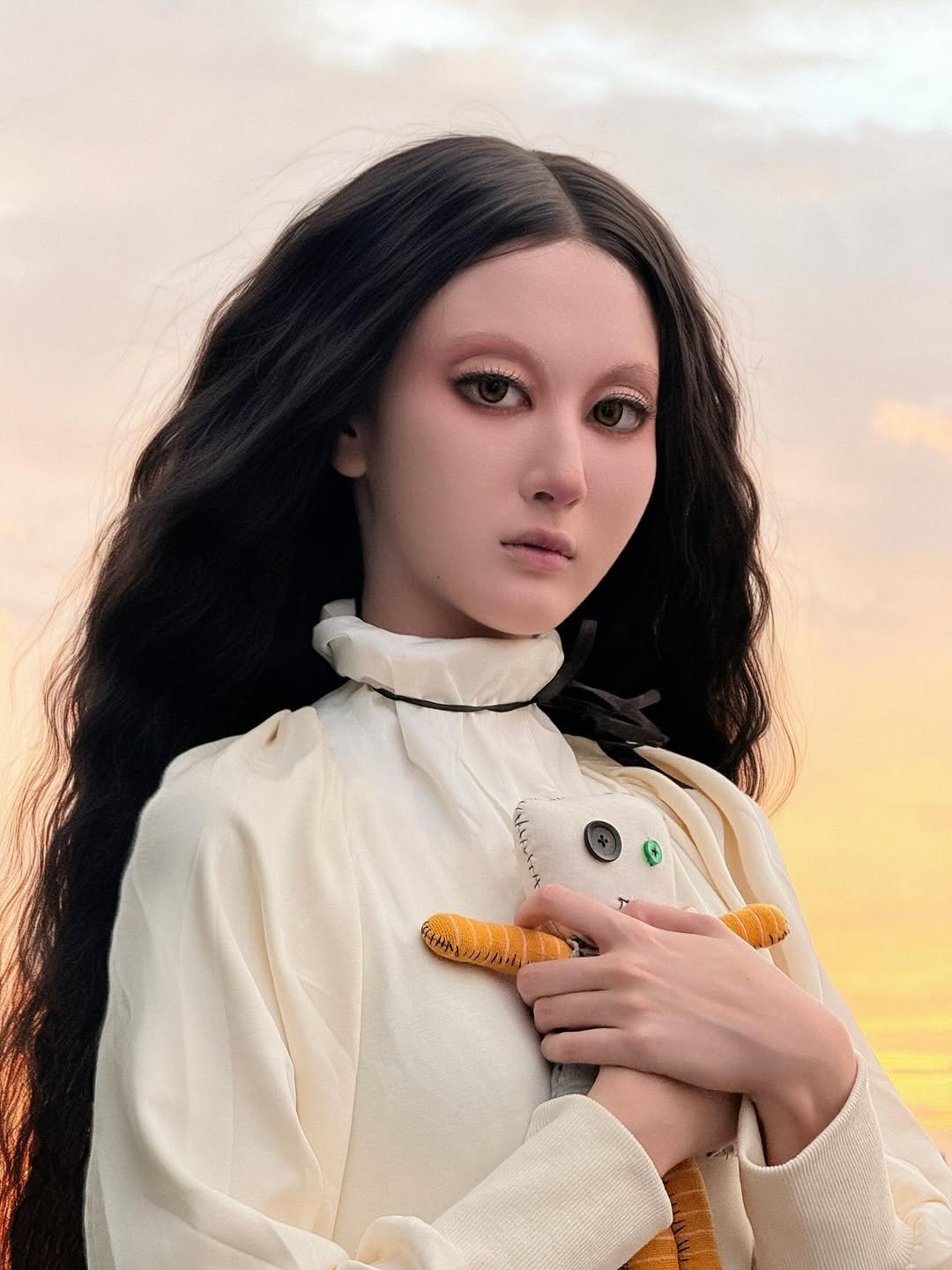 Photo shared by Benyapa j. on October 31, 2025 tagging @spophair, and @tonnow_mua. May be an image of one or more people, makeup, doll and text.