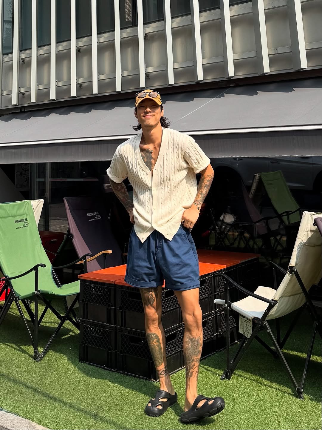 Photo shared by 비 르 on June 16, 2025 tagging @virstyle.kr. May be an image of 1 person, eyewear, wingtip shoes, shorts, bolo tie and text.