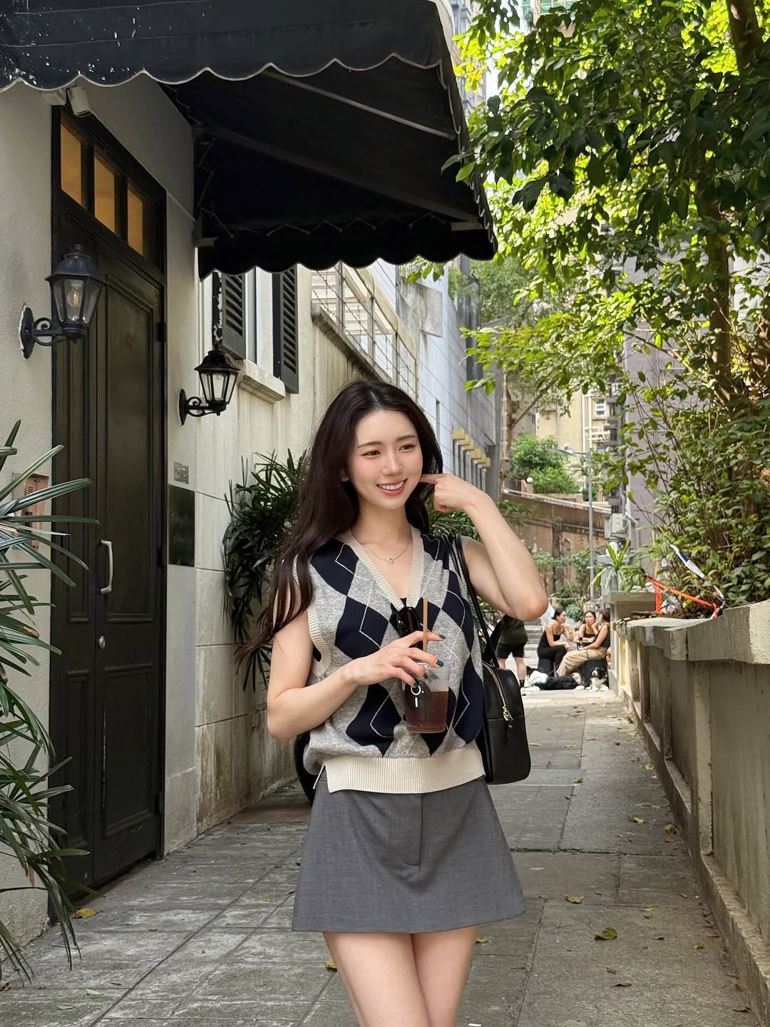 Photo by 박민정 Minjeong Park on October 26, 2025. May be an image of skirt, miniskirt, sundress and text.