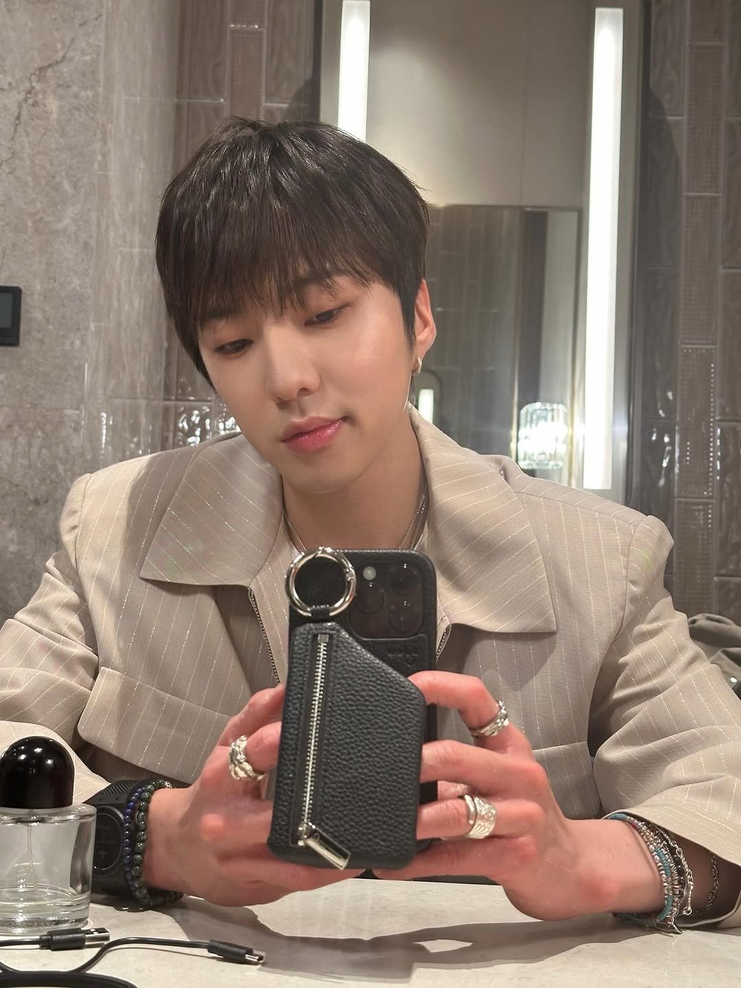 Photo by 강승윤 KANGSEUNGYOON on April 03, 2026. May be an image of bolo tie and text.