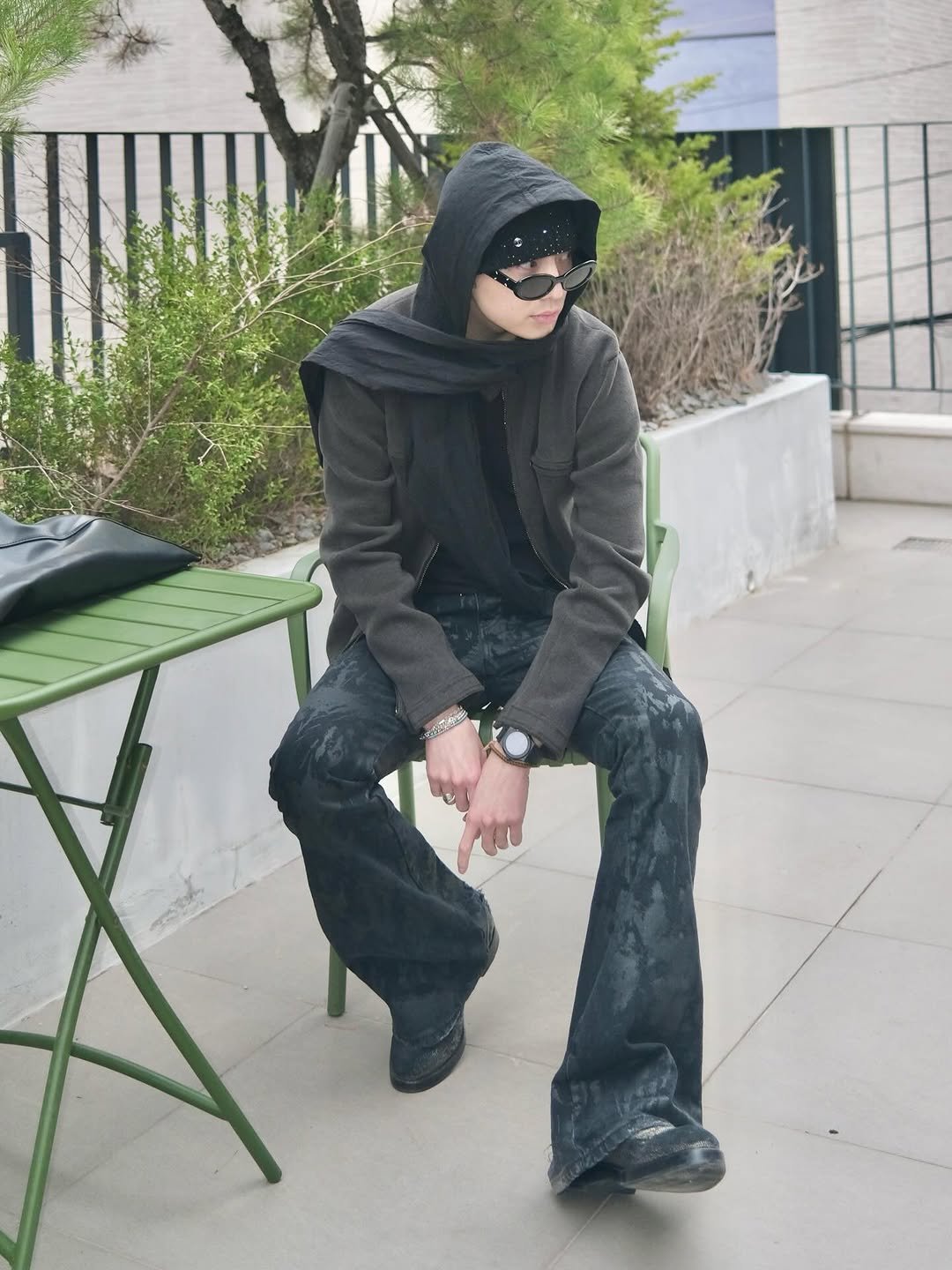 Photo by 강승윤 KANGSEUNGYOON on March 06, 2026. May be an image of overcoat, duffle coat, boots, parka, cloak, jacket and text.