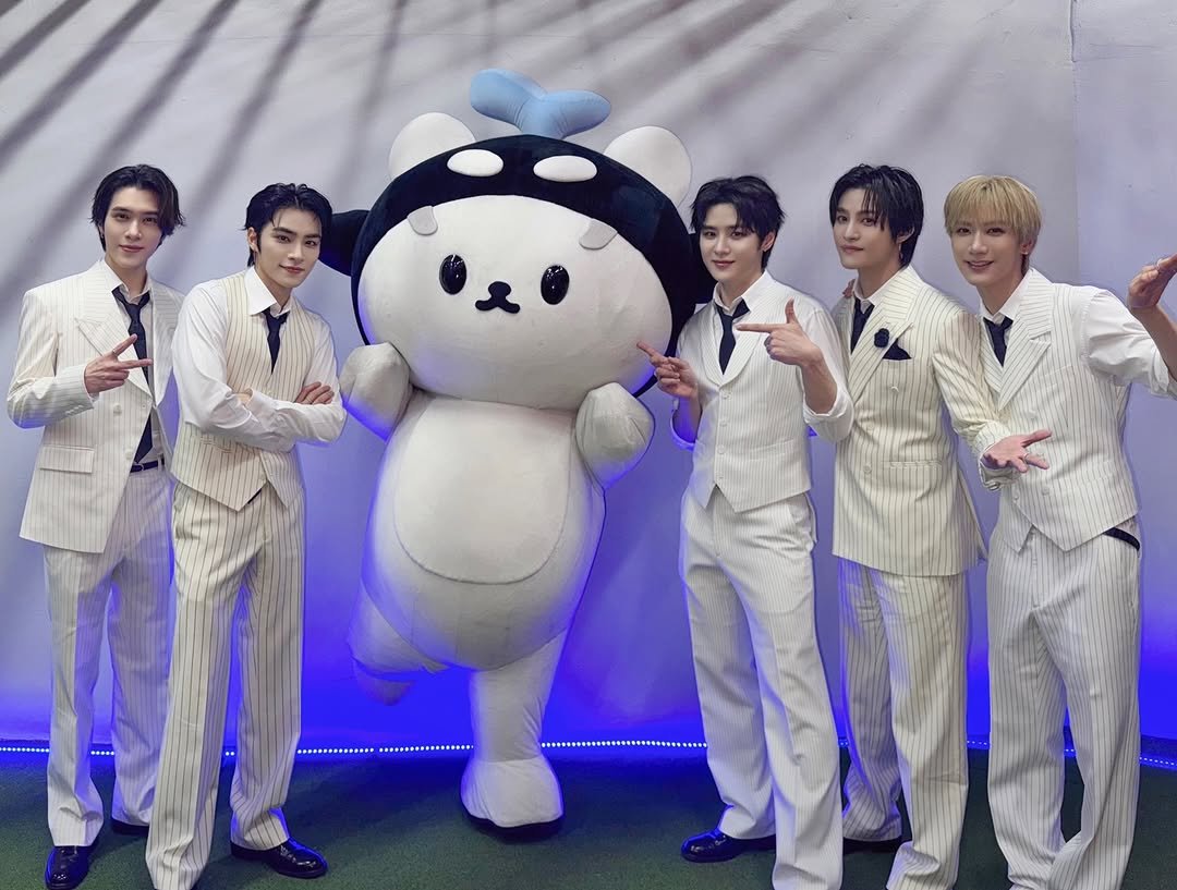 Photo by WayV on February 17, 2026. May be an image of one or more people, bangs and text.