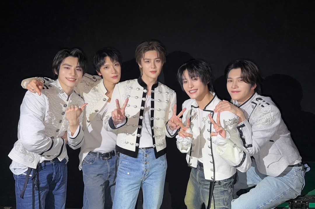 Photo by WayV on February 17, 2026. May be an image of one or more people, bangs and text.